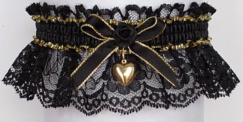 Black Gold Garters with a Gold Charm. Moire Greek Key Fancy Bands Garters on Black Lace